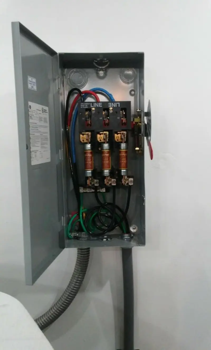 Three-phase disconnect switch installed for Smoke Detector Installation in Riverbank